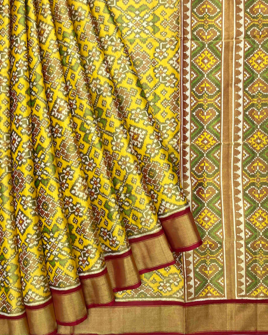 Maroon & Yellow Navratan Tissue Patola Saree