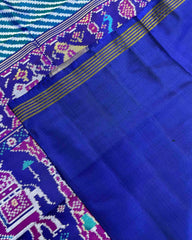 Blue & Turquoise Lining in White with Elephant Scut Border Patola Saree