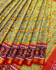 Red & Yellow Tinted Seagreen Navratan Patola Saree