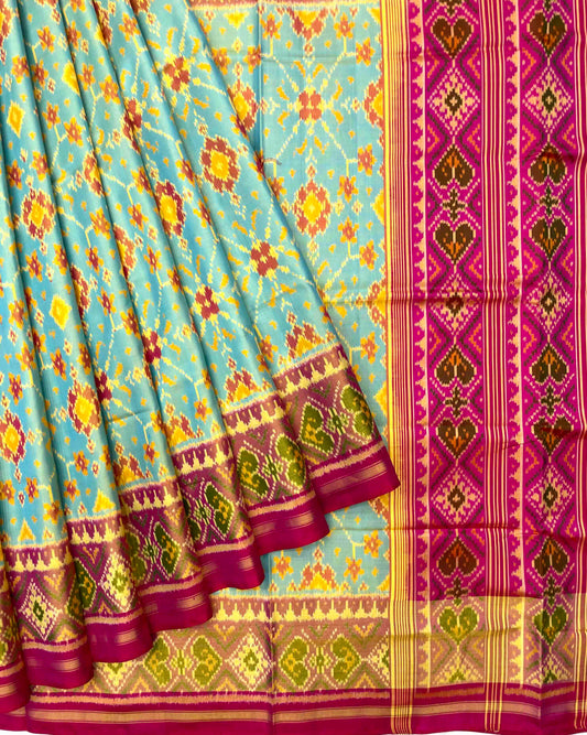 Pink & Yellowish Sky Blue Navratan Patola Saree