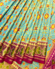 Pink & Yellowish Sky Blue Navratan Patola Saree