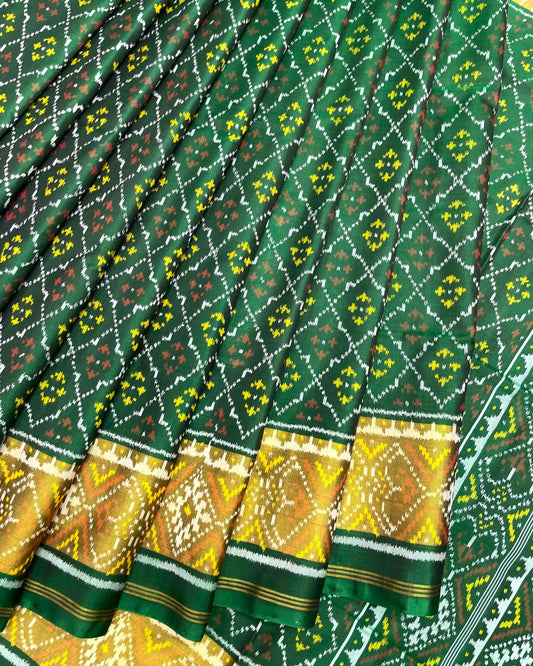 Green Buttonful Patola Saree