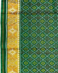 Green Buttonful Patola Saree