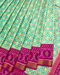 Pink & Sea Green Buttonful Patola Saree