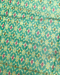 Pink & Sea Green Buttonful Patola Saree