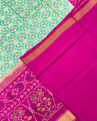 Pink & Sea Green Buttonful Patola Saree