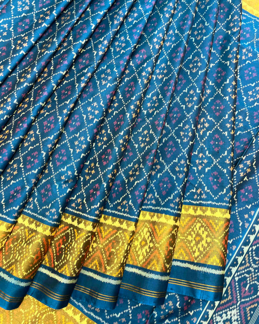 Turquoise Buttonful Patola Saree