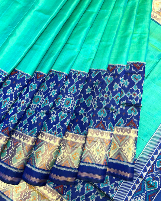 Blue & Sea Green Plain Manekchowk Navratan Mix Scut Border Patola Saree