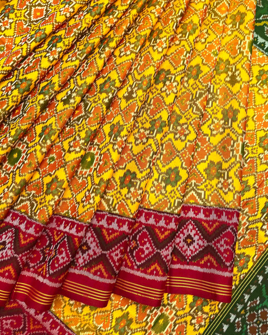 Yellow Ganga Jamuna Navratan Patola Saree