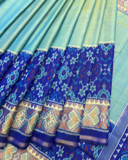 Blue & Light Green Plain with Navratan Scut Border Patola Saree