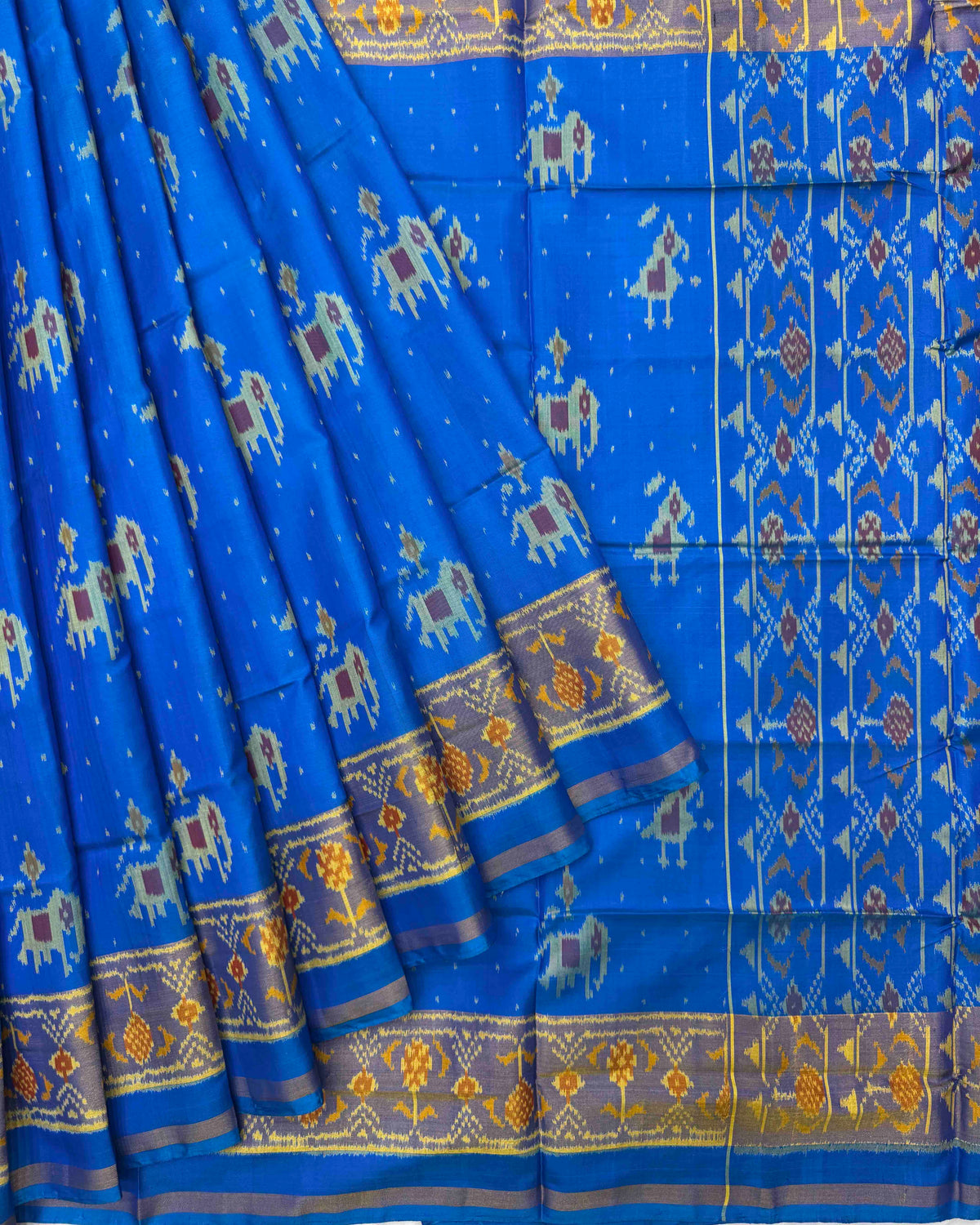 Sky Blue Narikunj Doted Patola Saree