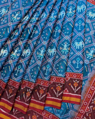 Red & Peacock Blue Narikunj Semi Double Ikat Patola Saree