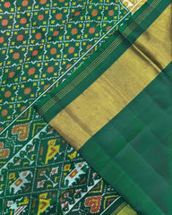 Green Buttonful Design Patola Saree