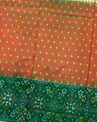 Green & Rust Doted with Navratan Scut Border Patola Saree